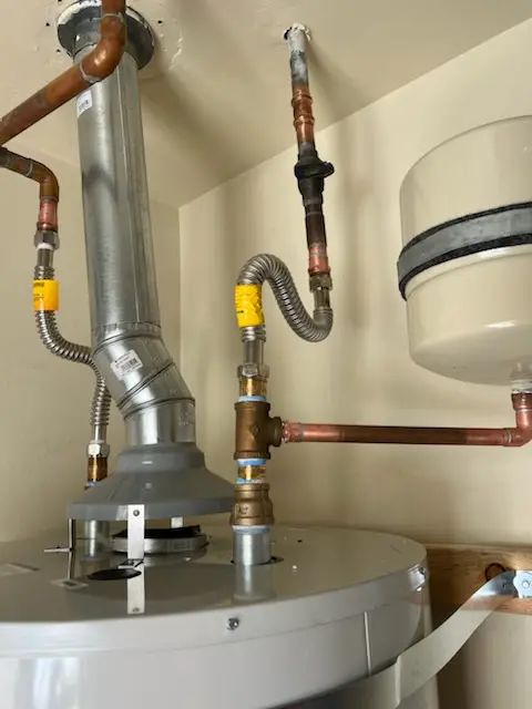 Water heater installation and plumbing repair in Dixonville